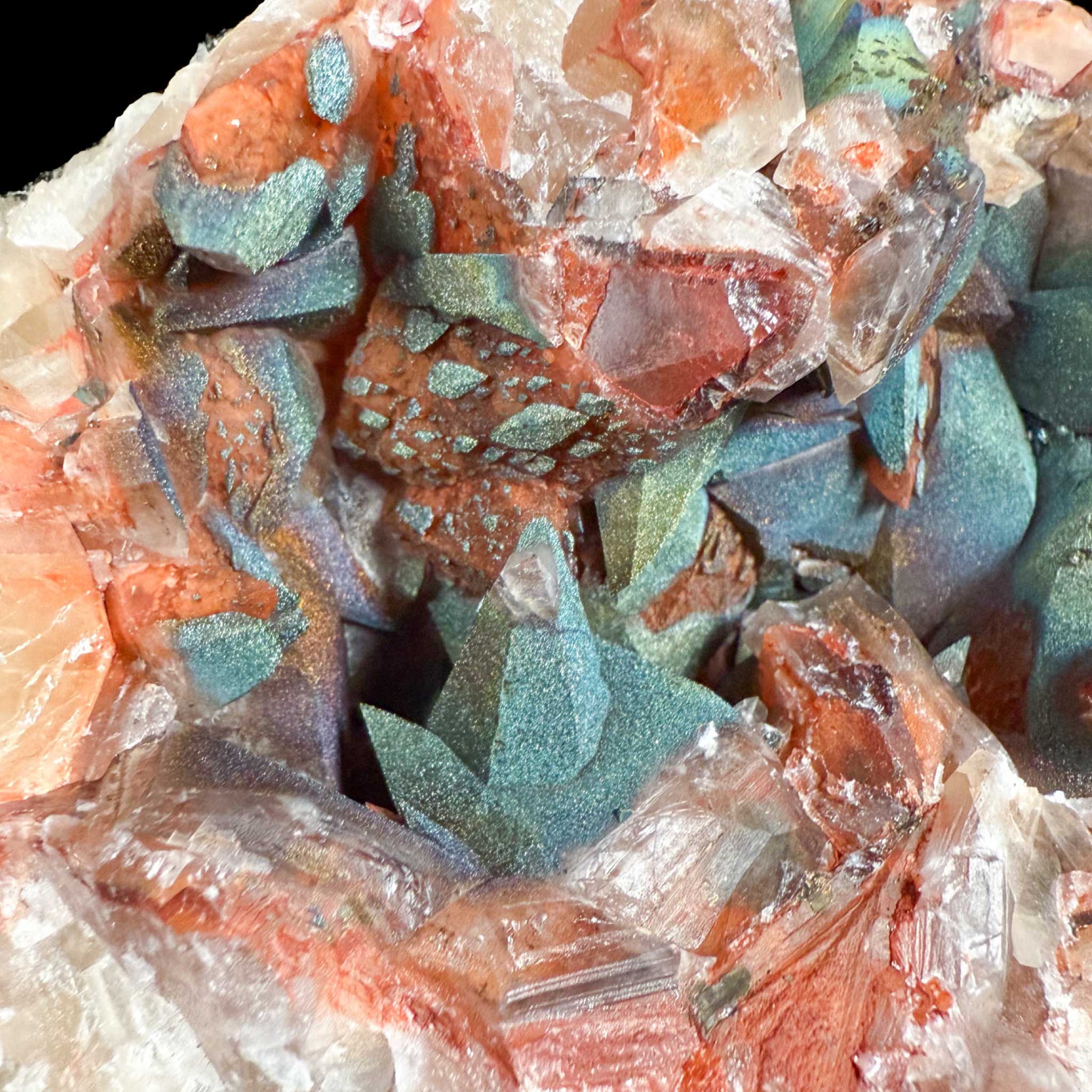 Close up of colorful Chalcopyrite on Calcite crystals