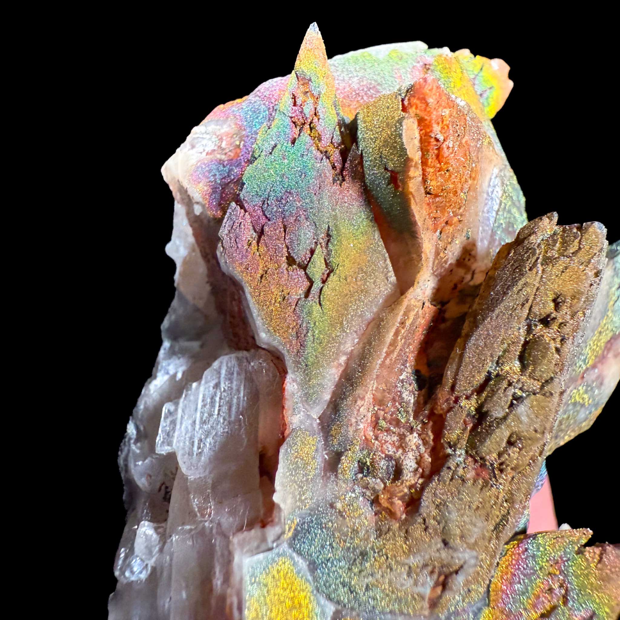 Close-up of rainbow colored Chalcopyrite and Calcite crystals