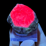 Ruby with Zoisite Displaying UV fluorescence 