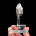 Sikhote Alin Meteorite on display stand