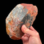 Red iron coating on large double terminated Smoky Quartz crystal