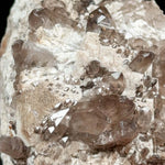 Close up of Smoky Quartz Crystals in Microcline from Utah