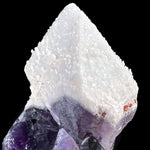 Close up of White Quartz Mineralization on top of Purple Amethyst Crystal