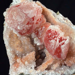 close up of drusy quartz crystals coating calcite crystals