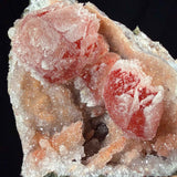 close up of drusy quartz crystals coating calcite crystals