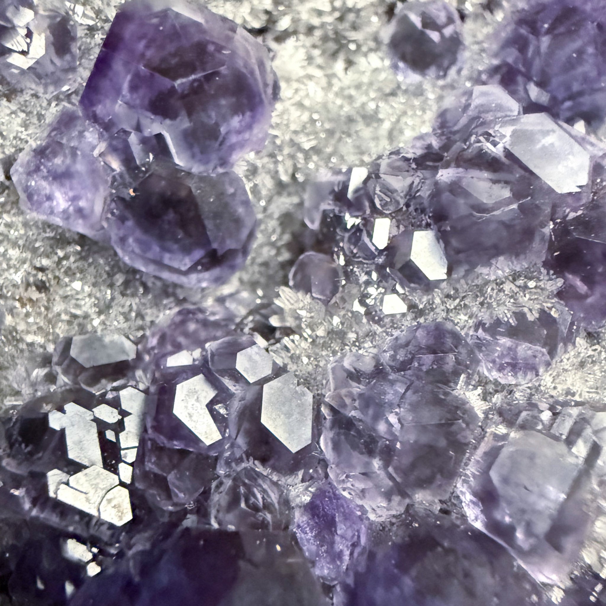 Close up of purple dodecahedral fluorite crystals