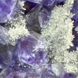 Close up of Purple Dodecahedron Fluorite crystals with Quartz