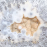 Close Up of Drusy Quartz Crystals inside Agate Slice