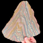 Unpolished back side of Tiger Iron Slice