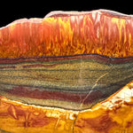 Close up of red and gold Tiger Eye stone from Australia