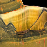 Close up of Tiger Eye crystal fibers in Tiger Iron Slice from Australia