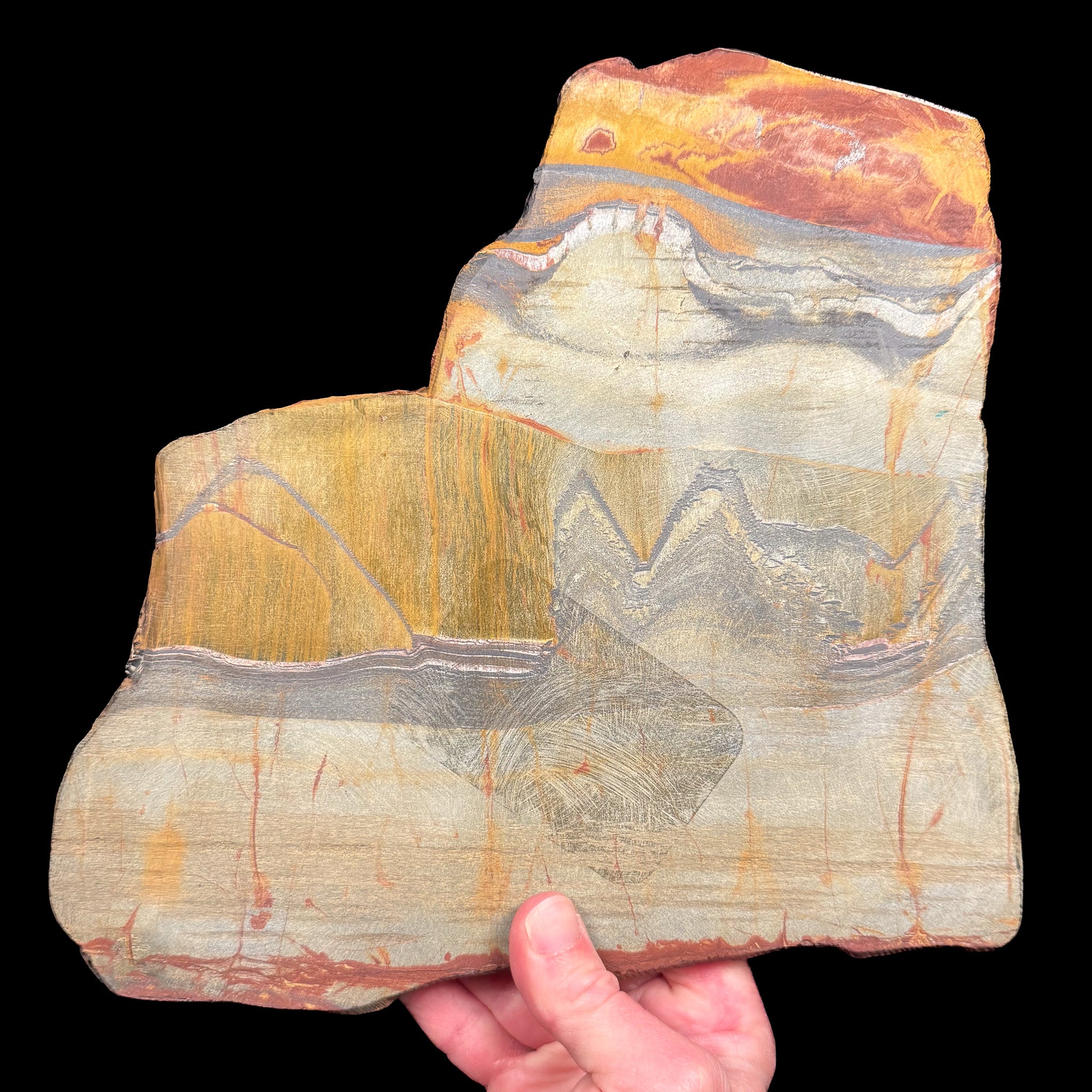 Unpolished back side of Tiger Iron Slice