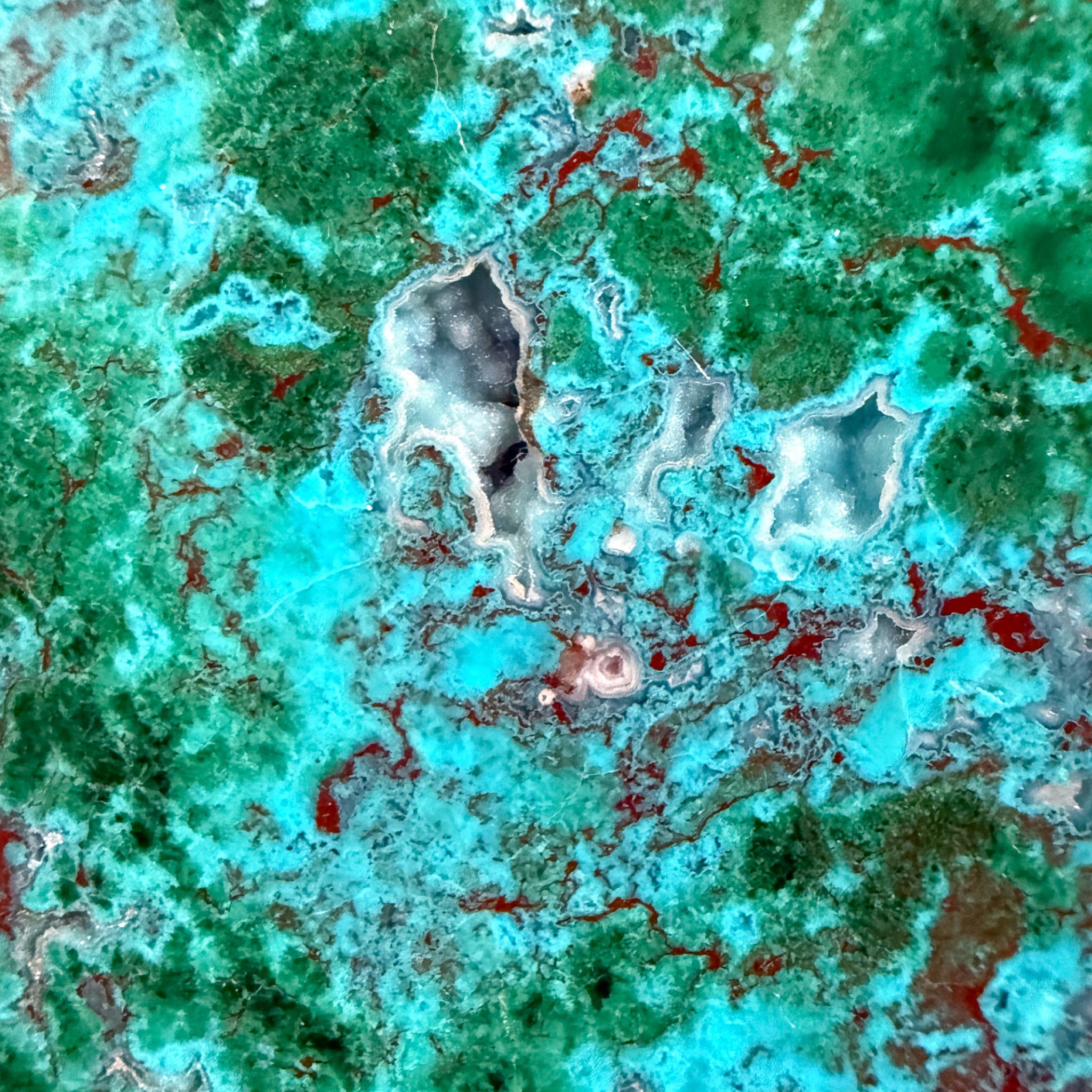 Close up of Quartz crystal pocket with blue chrysocolla and green malachite from Australia