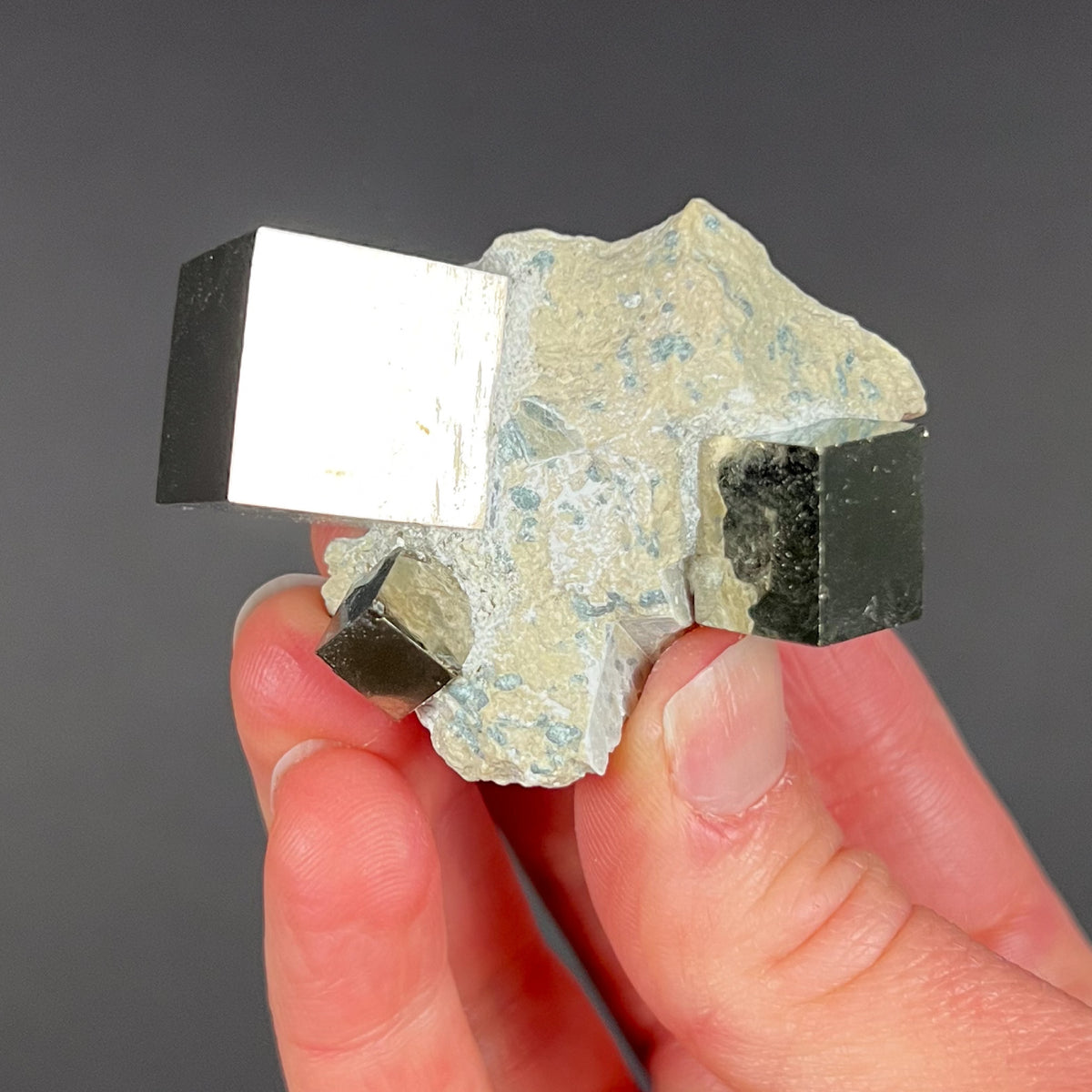 Cubes of Pyrite on Matrix
